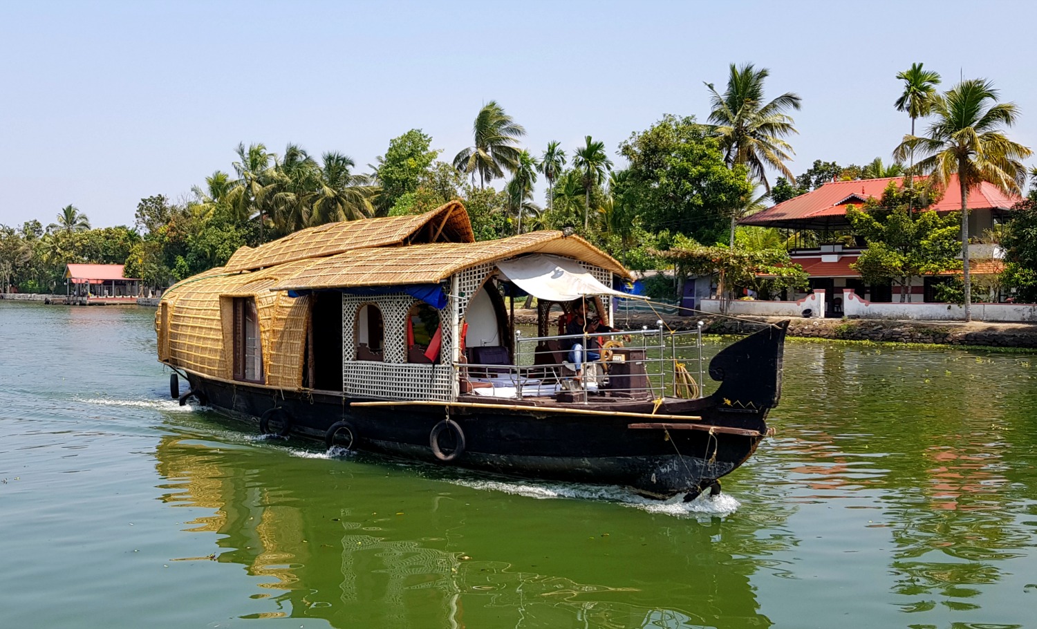 Aegiscabs 1374407238kerala-india-houseboat-backwaters-houses.jpg